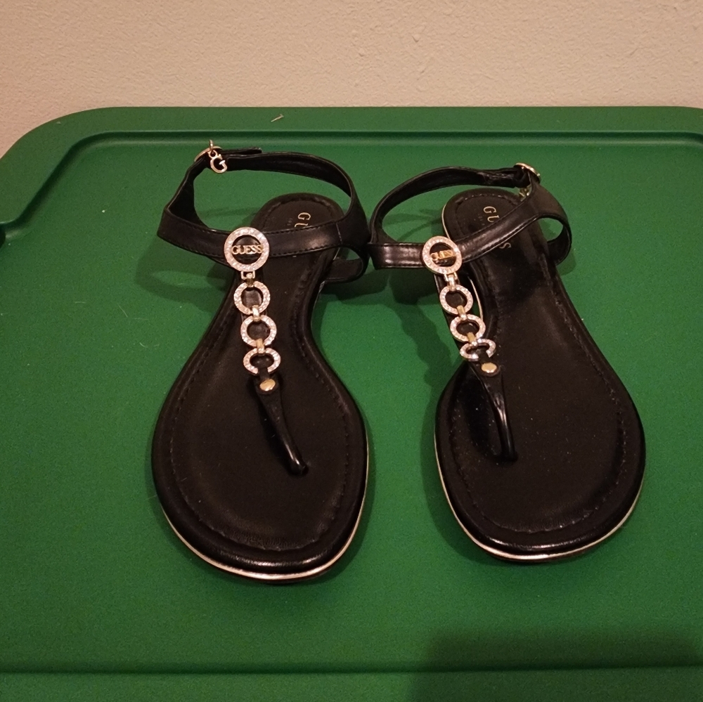 Black and gold guess sandals
